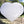 Load image into Gallery viewer, This beautiful  selenite heart has the lotus etched on it.